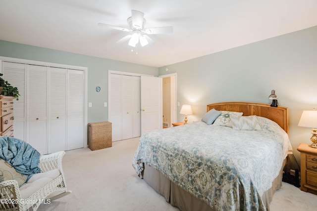 34 Aspen Rd, Colonie, NY 12110 - bedroom with multiple closets, light colored carpet, and a ceiling fan
