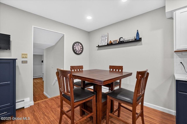 5 Pine Crst, Malta, NY 12019 - dining space featuring baseboard heating, wood finished floors, and recessed lighting