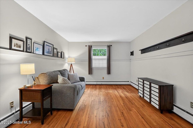 5 Pine Crst, Malta, NY 12019 - sitting room with wood finished floors, a baseboard radiator, and baseboard heating