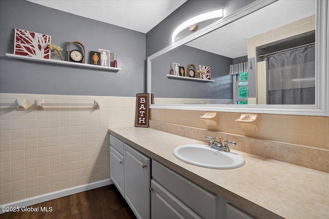 5 Pine Crst, Malta, NY 12019 - bathroom with vanity, wood finished floors, and tile walls