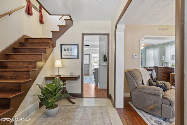 2730 Denver Ave, Rotterdam, NY 12306 - entryway featuring stairs, ceiling fan, and wood finished floors