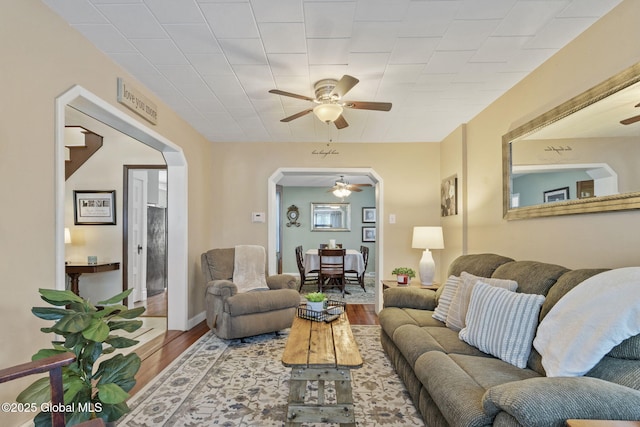 2730 Denver Ave, Rotterdam, NY 12306 - living area with ceiling fan, arched walkways, and wood finished floors