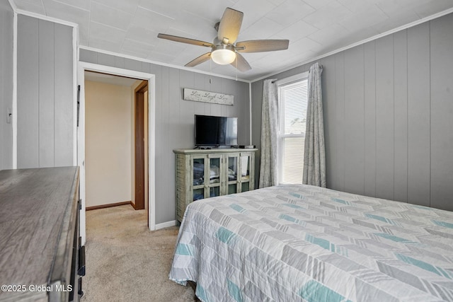 2730 Denver Ave, Rotterdam, NY 12306 - carpeted bedroom featuring ornamental molding, a ceiling fan, and wooden walls