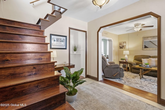 2730 Denver Ave, Rotterdam, NY 12306 - stairway with a ceiling fan, wood finished floors, and arched walkways