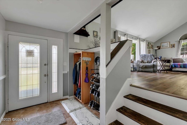 3140 State Route 5s, Danube, NY 13339 - entryway with stairway and vaulted ceiling