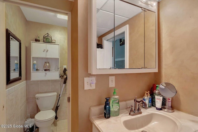 3140 State Route 5s, Danube, NY 13339 - bathroom featuring vanity and tile walls