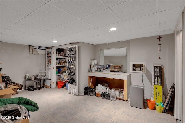 3140 State Route 5s, Danube, NY 13339 - finished below grade area featuring tile patterned floors, a paneled ceiling, and recessed lighting
