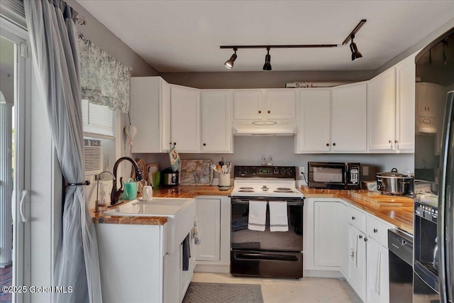 3140 State Route 5s, Danube, NY 13339 - kitchen featuring black appliances, under cabinet range hood, and white cabinets