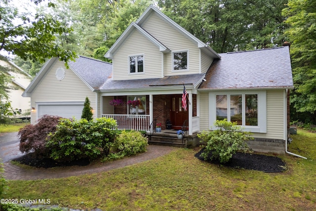 69 Deer Run Holw, Halfmoon, NY 12065 - traditional home with covered porch, a garage, roof with shingles, and a front yard