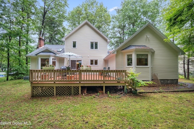 69 Deer Run Holw, Halfmoon, NY 12065 - rear view of property with a yard, a deck, and a chimney