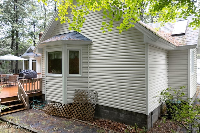 69 Deer Run Holw, Halfmoon, NY 12065 - view of home's exterior with a wooden deck and outdoor dining space