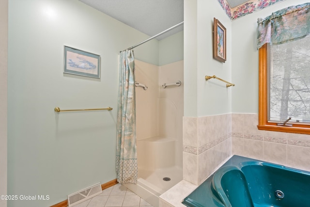 69 Deer Run Holw, Halfmoon, NY 12065 - full bathroom with a jetted tub, tile patterned floors, and a shower with curtain