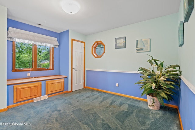 69 Deer Run Holw, Halfmoon, NY 12065 - carpeted spare room featuring baseboards