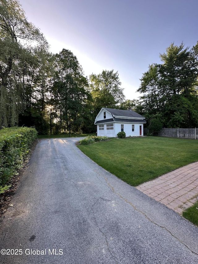 945 Morgan Ave, Niskayuna, NY 12309 - view of home's exterior with a garage and asphalt driveway
