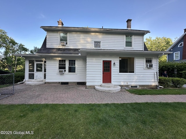 945 Morgan Ave, Niskayuna, NY 12309 - back of property with a chimney, a patio area, and cooling unit