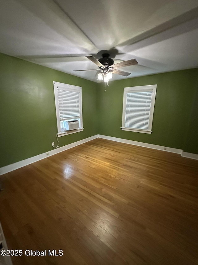 945 Morgan Ave, Niskayuna, NY 12309 - spare room featuring wood finished floors, cooling unit, and a ceiling fan