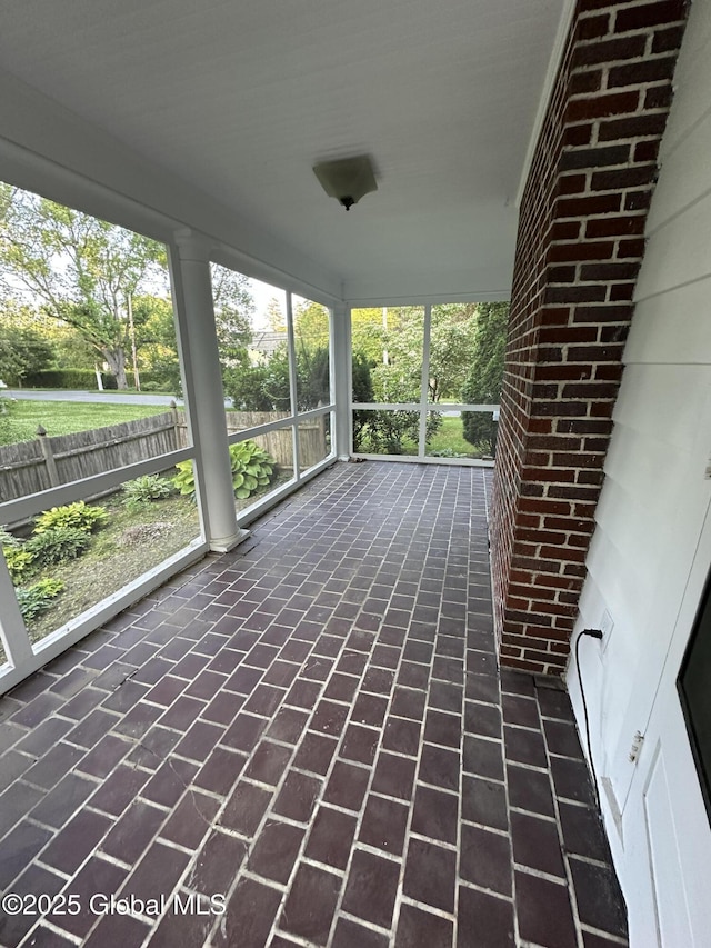 945 Morgan Ave, Niskayuna, NY 12309 - unfurnished sunroom with brick flooring