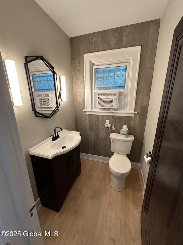 945 Morgan Ave, Niskayuna, NY 12309 - half bathroom featuring cooling unit, hardwood / wood-style floors, and vanity