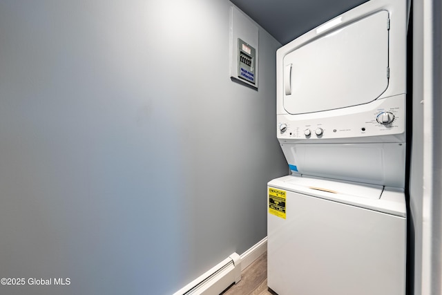 92 Central Ave, Rensselaer, NY 12144 - laundry room with stacked washing machine and dryer and light wood-type flooring