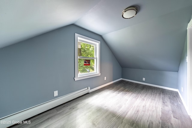 92 Central Ave, Rensselaer, NY 12144 - bonus room featuring a baseboard radiator, wood finished floors, and vaulted ceiling