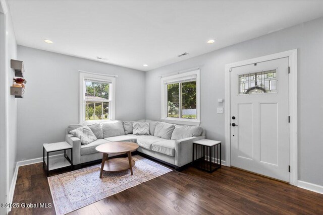 1 Stewart St, Colonie, NY 12205 - living area with plenty of natural light, dark wood finished floors, and recessed lighting