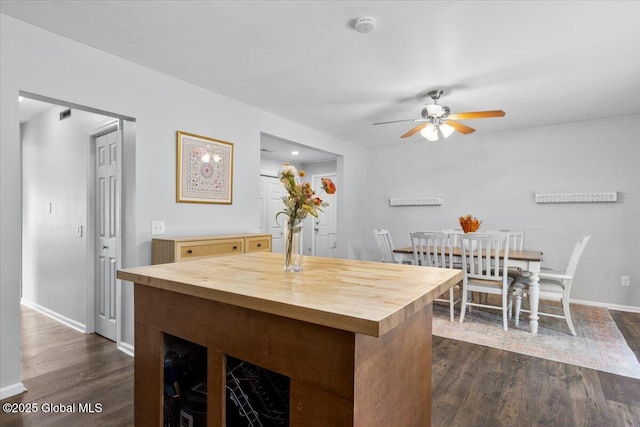 1 Stewart St, Colonie, NY 12205 - kitchen with butcher block counters, ceiling fan, and dark wood-type flooring