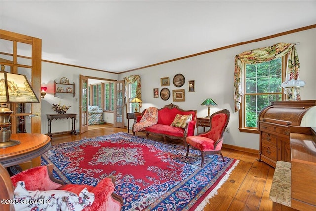 6 Leaward Way, Saratoga Springs, NY 12866 - living area with crown molding, healthy amount of natural light, and wood-type flooring