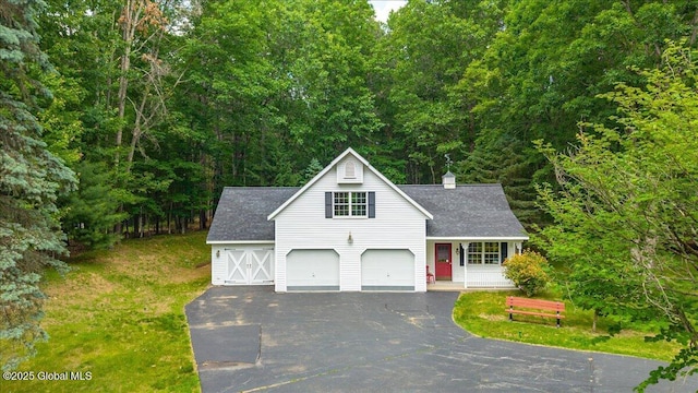 6 Leaward Way, Saratoga Springs, NY 12866 - view of front of property featuring roof with shingles, driveway, a front yard, and a porch