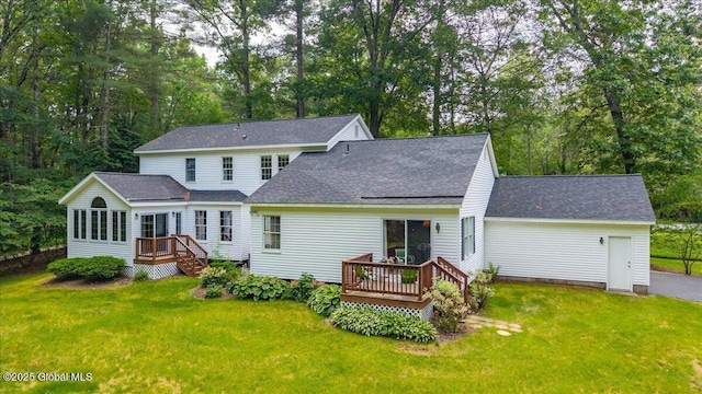 6 Leaward Way, Saratoga Springs, NY 12866 - back of property featuring a wooden deck, a shingled roof, and a lawn
