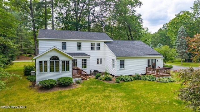6 Leaward Way, Saratoga Springs, NY 12866 - rear view of property featuring a wooden deck, a lawn, and a shingled roof