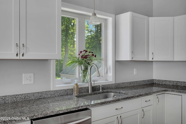 9 Sebring Ave, Colonie, NY 12205 - kitchen with dishwasher, white cabinets, dark stone counters, and hanging light fixtures