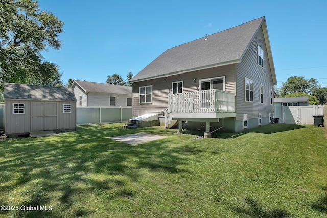 9 Sebring Ave, Colonie, NY 12205 - back of property with a deck, a fenced backyard, a storage unit, and a patio area