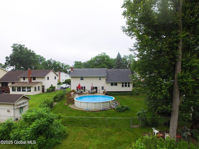 46 Cindy Crest Dr, Rotterdam, NY 12306 - back of property with an outdoor pool