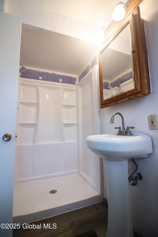 46 Cindy Crest Dr, Rotterdam, NY 12306 - full bathroom with a stall shower and wood finished floors
