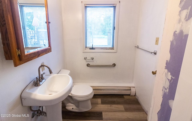 46 Cindy Crest Dr, Rotterdam, NY 12306 - bathroom featuring a baseboard radiator and wood finished floors