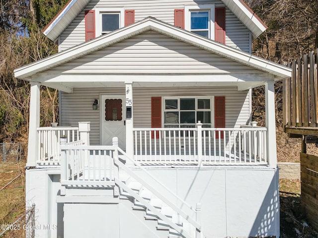 55 Spring Ave, Troy, NY 12180 - view of front facade with a porch and stairs