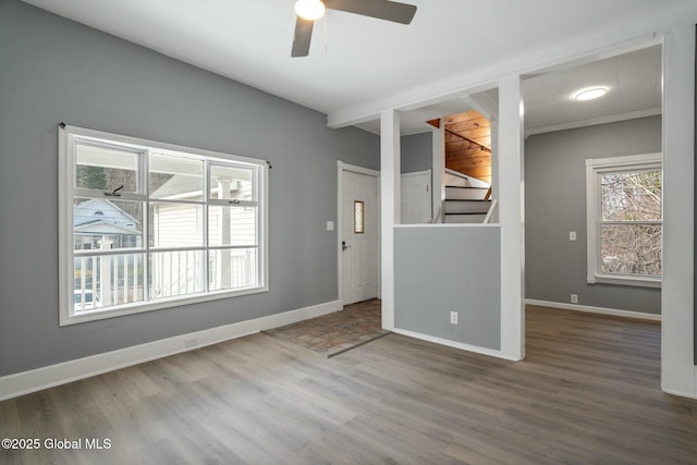 55 Spring Ave, Troy, NY 12180 - unfurnished room featuring wood finished floors, a ceiling fan, and stairway