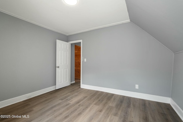 55 Spring Ave, Troy, NY 12180 - spare room with wood finished floors, lofted ceiling, and crown molding