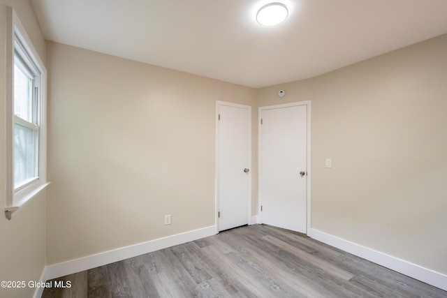 1041 Madison Ave, Troy, NY 12180 - empty room with wood finished floors