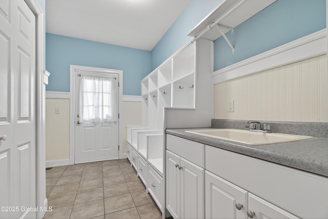 10 Sweetbriar Dr, Wilton, NY 12831 - laundry room featuring light tile patterned floors and a sink