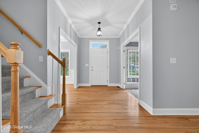 10 Sweetbriar Dr, Wilton, NY 12831 - entryway featuring crown molding, stairs, and light wood-type flooring