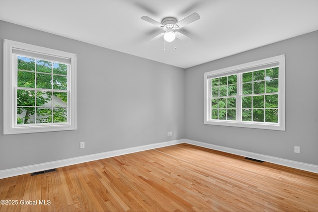 10 Sweetbriar Dr, Wilton, NY 12831 - empty room with healthy amount of natural light, light wood finished floors, and a ceiling fan