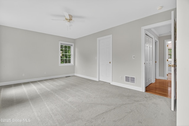 10 Sweetbriar Dr, Wilton, NY 12831 - empty room with carpet flooring, ceiling fan, a smoke detector, and crown molding