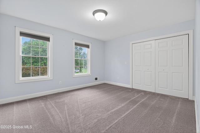 10 Sweetbriar Dr, Wilton, NY 12831 - unfurnished bedroom featuring carpet floors and a closet