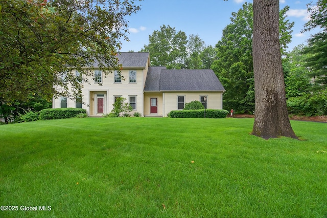 10 Sweetbriar Dr, Wilton, NY 12831 - colonial inspired home with a front lawn and roof with shingles