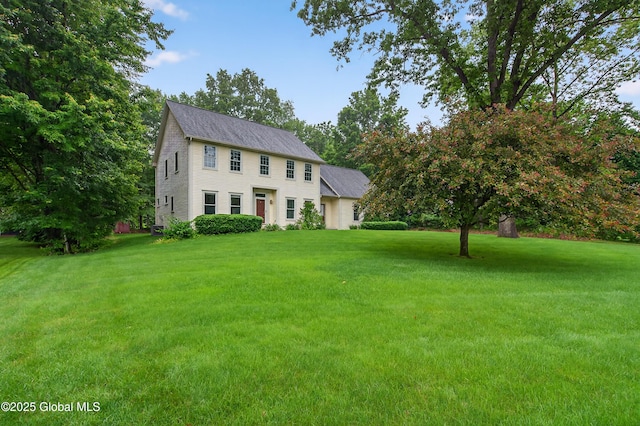 10 Sweetbriar Dr, Wilton, NY 12831 - colonial-style house featuring a front lawn