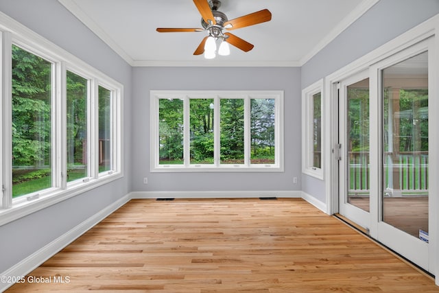 10 Sweetbriar Dr, Wilton, NY 12831 - unfurnished sunroom with plenty of natural light, wood finished floors, and ornamental molding