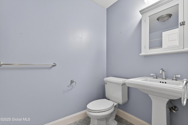 10 Sweetbriar Dr, Wilton, NY 12831 - half bathroom featuring toilet and tile patterned floors