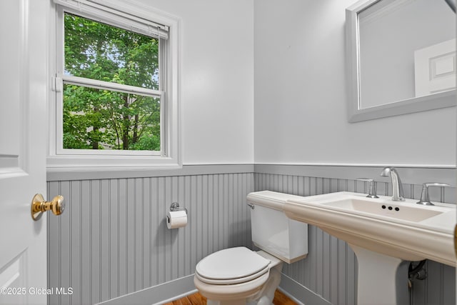 10 Sweetbriar Dr, Wilton, NY 12831 - bathroom with wainscoting and wood finished floors
