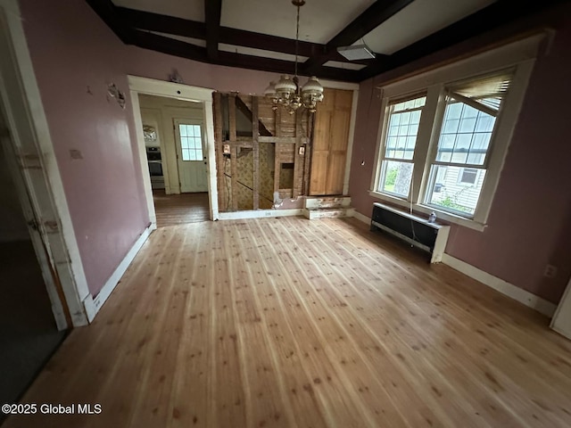 7 Frost Pl, Albany, NY 12205 - unfurnished dining area featuring hardwood / wood-style flooring, a chandelier, coffered ceiling, beamed ceiling, and radiator